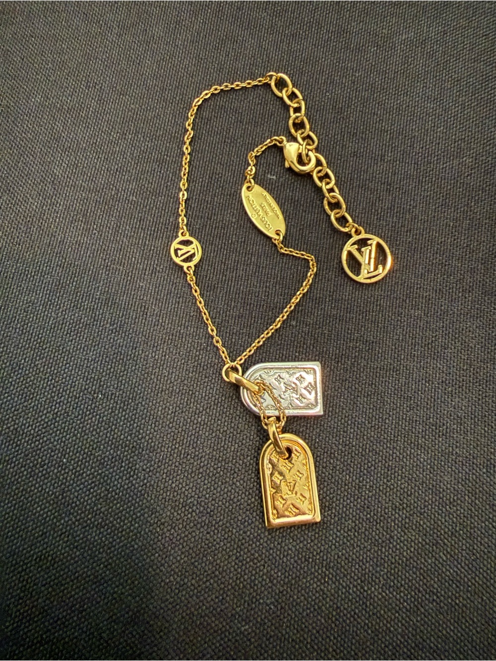 Louis Vuitton Monogram Double Tag bracelet Gold & Silver